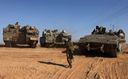 Israeli troops are pictured at their position in southern Israel along the border with the Gaza Strip from on May 14, 2021. by the Forward
			