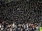 Ultra-Orthodox Jews gather at the grave site of Rabbi Shimon Bar Yochai at Mount Meron in northern Israel on April 29, 2021 as they celebrate the Jewish holiday of Lag BaOmer, marking the anniversary of the death of the Talmudic sage, approximately 1,900 years ago by the Forward
			