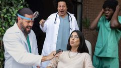 Rachel Wolfson in an uncomfortable scene with, from left, Chris Pontius, Eric Andre, and Eric Manaka — and a scorpion — in "Jackass: Forever." (Paramount Pictures) by the Forward
			