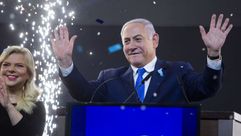 Israeli Prime Minster Benjamin Netanyahu and his wife Sara greet supporters during his victory speech on April 10, 2019 in Tel Aviv, Israel. by the Forward