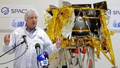 Israeli Aerospace Industries director of Space division Opher Doron speaking in front of Beresheet on December 17, 2018. by the Forward