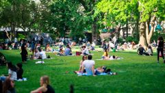 New Yorkers socially distance at Madison Square Park. by the Forward
			