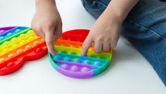 Pop-it fidget toys were originally invented by Theo and Ora Coster, an Israeli couple who created countless games over decades of partnership. by the Forward
			