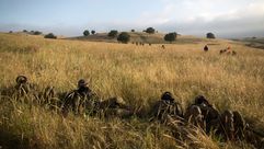 Israeli soldiers of "Netzah Yehuda" take part in annual unit training in the Israeli annexed Golan Heights on May 19, 2014. by the Forward
			