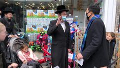 Mayoral candidate Andrew yang meets voters on visit to Borough Park on April 09,2021 by the Forward
			