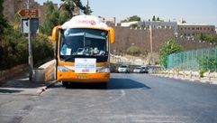 A Birthright bus parked outside the Old City in Jerusalem. by the Forward
			