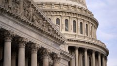 U.S. Capitol building by the Forward
			