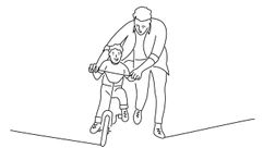 A parent helping a child on a bike. by the Forward
			