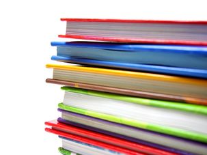 A stack of books with colorful bindings. by the Forward 