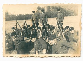 Group photo of auxiliary (Trawniki) guards at the Sobibor killing center, spring 1943. by the Forward
			
