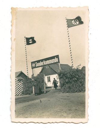 Gate of the Sobibor killing center, 1942-43. Transports of Jews entered the camp through this gate. The gate was covered with tree branches in order to camouflage the killing that occurred there. by the Forward
			