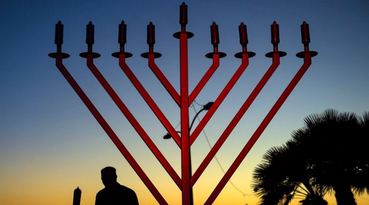 A Chabad menorah, distinguished by the diagonal—rather than curved—arms. (Mindy Schauer/Digital First Media/Orange County Register via Getty Images)