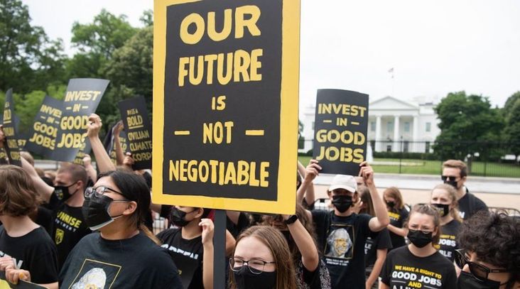 Protesters with the Sunrise Movement protest in front of the White House in Washington, DC, June 4, 2021. (Saul. Loeb/AFP via Getty Images)