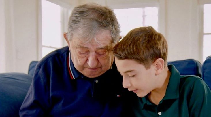 Holocaust survivor Jack Feldman and his great-grandson Elliott Saiontz in a scene from the HBO documentary “The Number on Great-Grandpa’s Arm.” (HBO)