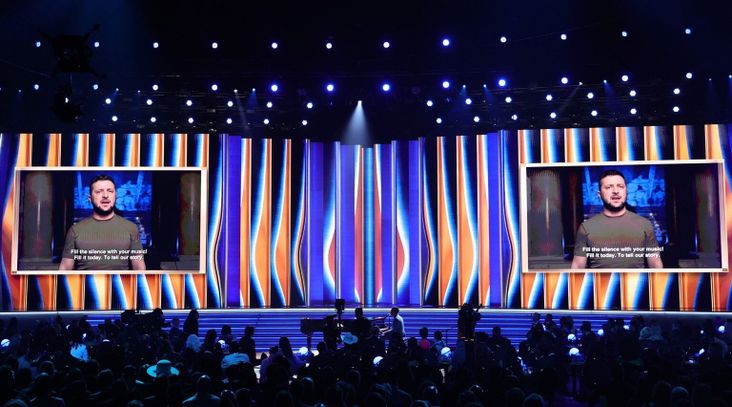 President Volodymyr Zelenskyy speaks on screen during the 64th Annual Grammy Awards at MGM Grand Garden Arena in Las Vegas, April 3, 2022. (Rich Fury/Getty Images for The Recording Academy)