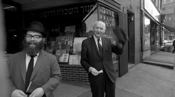 Author Isaac Bashevis Singer poses for a portrait outside the S. Rabinowitz Hebrew Book Store on New York's Lower East Side in 1968.