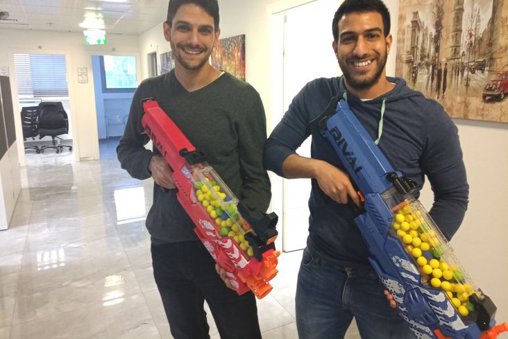 Jewish Israeli high-tech company co-founder with his friend and Muslim Israeli employee.