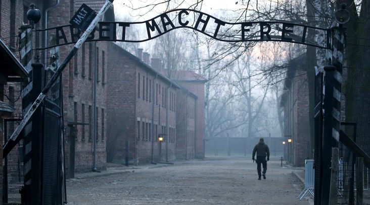 The entrance to the former Auschwitz concentration camp. (Natalia Fedosenko/TASS via Getty Images)