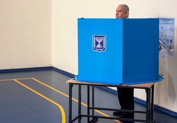 Israeli Prime Minister Benjamin Netanyahu casts his vote at a voting station in Jerusalem on September 17, 2019.