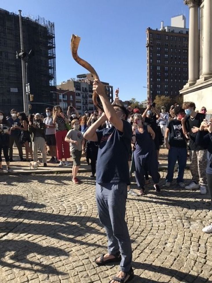 Rabbi Andy Bachman blew the shofar repeated as a joyful crowd gathered in Brooklyn.