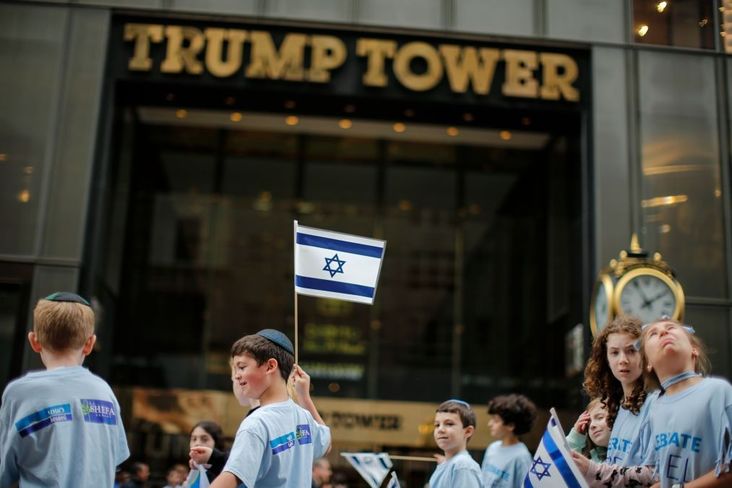 People march in front of Trump Tower during the annual Celebrate Israel Parade on June 3, 2018 in New York City.