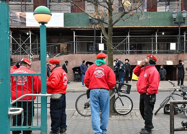 Members of the Guardian Angels stand outside of the Chabad Lubavitch World Headquarters in the Crown Heights neighborhood of Brooklyn, Sunday, December 29, 2019.
