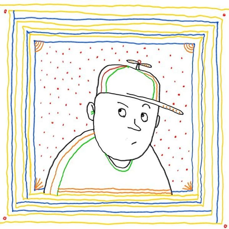 Kid in propeller hat.