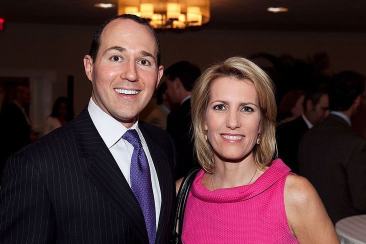 Raymond Arroyo and Laura Ingraham, Fox News Contributor and host of the Laura Ingraham Show, pose for a photo at the Washington DC Conde Nast Traveler celebration at Height's Courtyard - Washington Hilton on June 24, 2010 in Washington, DC.