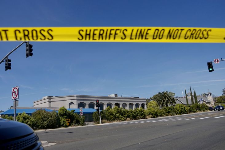 Crime scene tape in front of a synagogue after a shooting in Poway.