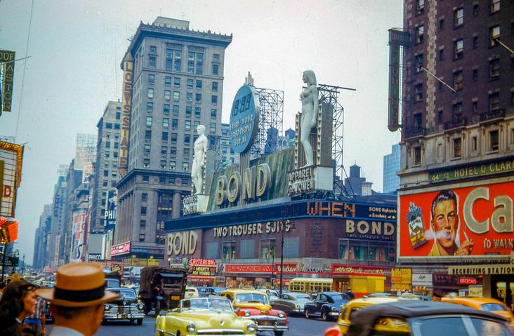 Times Square in the 1940s featuring a smoking ad for Camel cigarettes