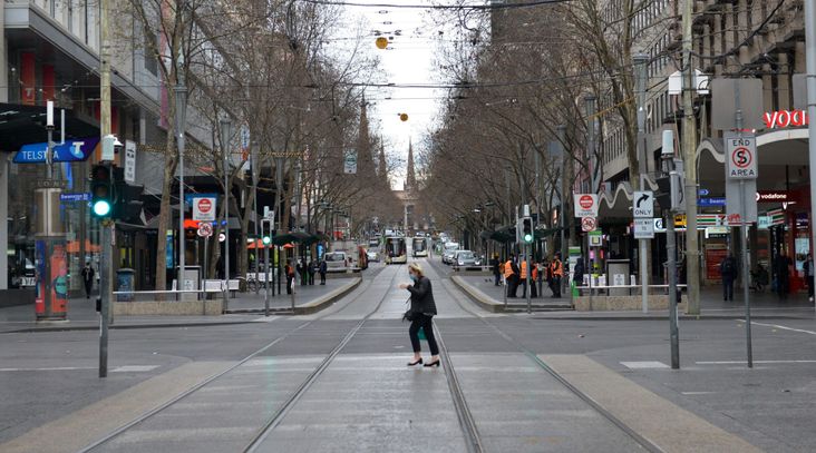 A view of an empty street in Melbourne, Australia on Aug. 11, 2021, after the city extended its latest COVID-19 lockdown.