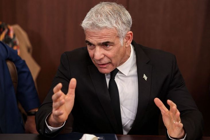 Israeli Foreign Minister Yair Lapid speaks during the weekly cabinet meeting at the Prime Minister's office in Jerusalem on February 13, 2022. (Photo by Menahem Kahana/AFP via Getty Images)