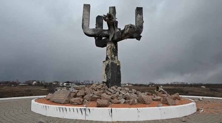 A view of the memorial, set on the place of a mass killing of Jewish people by Nazis during WWII, a day after it was damaged in a Russian shelling, at the entrance of the Drobitsky Yar Holocaust memorial complex on the eastern outskirts of Kharkiv, Mar. 27, 2022. (Sergey Bobok/ AFP via Getty Images)