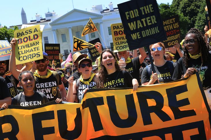 Sunrise Movement protesters demonstrate in favor of a Civilian Climate Corps. in front of the White House in June.