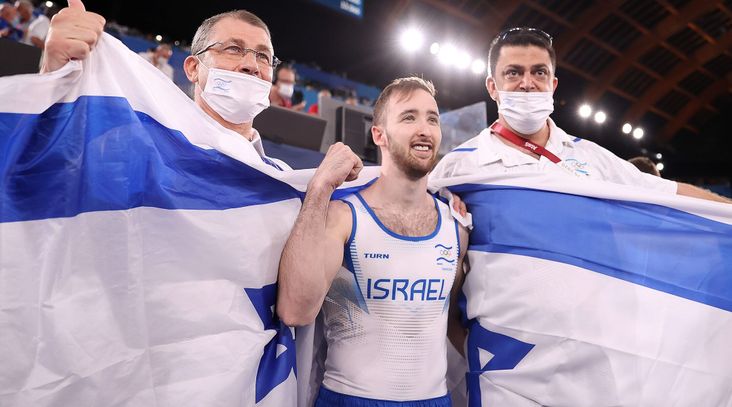 Artem Dolgopyat of Team Israel celebrates winning gold in the men's floor exercise final at the Tokyo 2020 Olympic Games, Aug. 1, 2021.