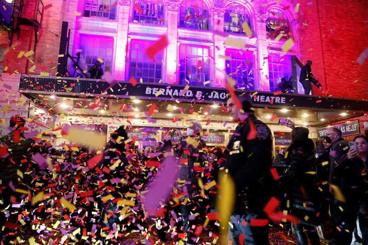 Confetti falls in front of Broadway theater