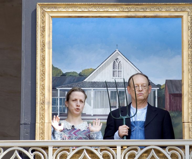 Actors recreate Grant Wood's "American Gothic."