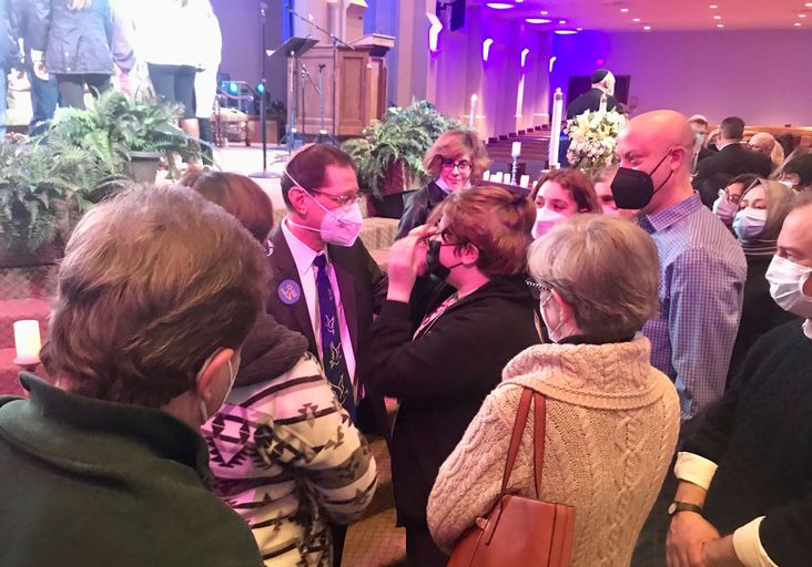 Rabbi Charlie Cytron-Walker greets well-wishers after a healing service at a local church Monday evening.