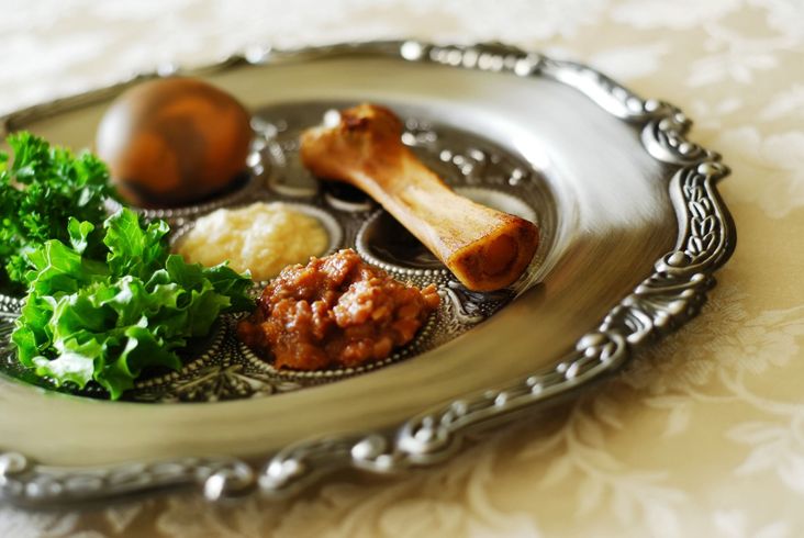 A Seder plate at Passover on a tablecloth