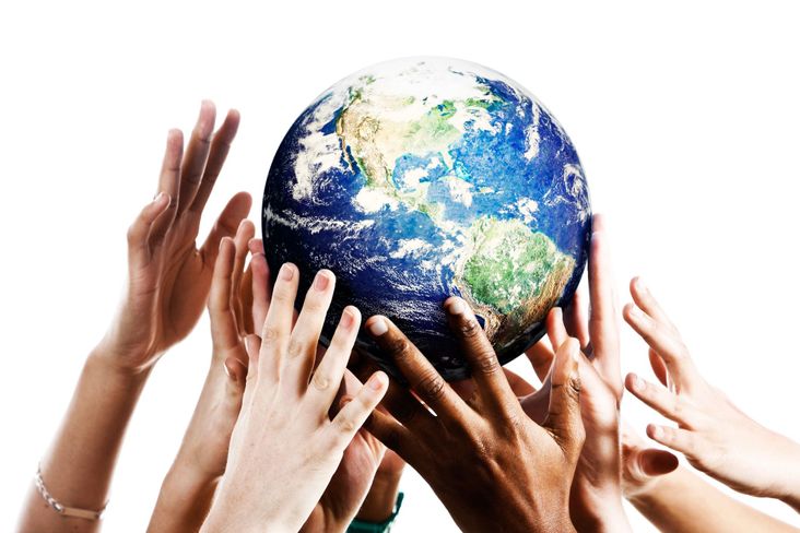 Hands holding earth
