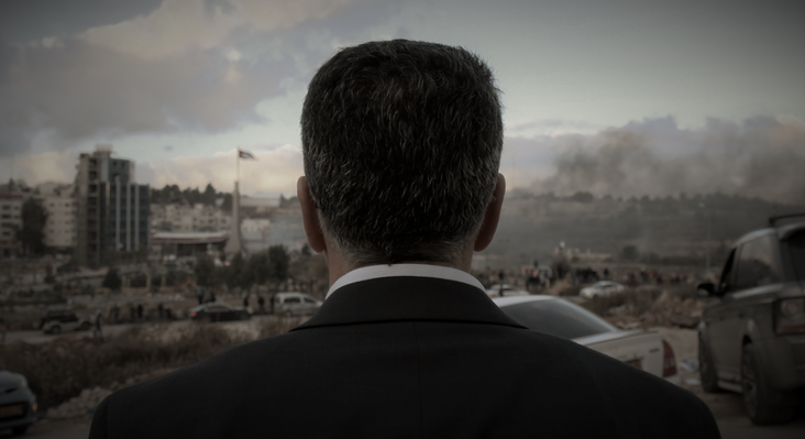 A still from David Osit's film 'Mayor,' showing Ramallah's Mayor Musa Hadid from behind