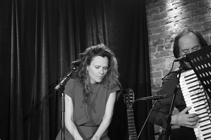 Niki Jacobs performs with her accordionist in Saratoga Springs