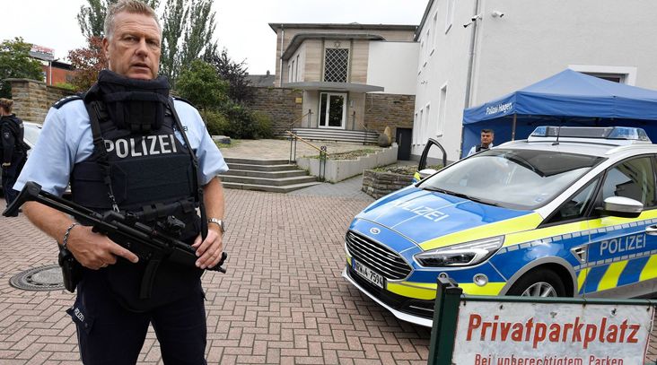 Police guard the synagogue of Hagen, Germany, Sept. 16, 2021.
