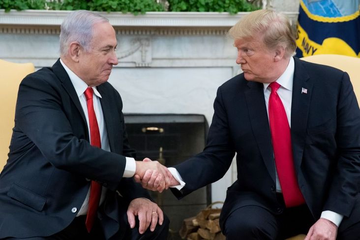 President Donald J. Trump and Prime Minister of Israel Benjamin Netanyahu shake hands in the Oval Office of the White House, March 25, 2019.