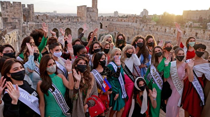 Contestants of the Miss Universe pageant visit the Tower of David Museum in the ancient citadel of Jerusalem near the Jaffa Gate entrance to Jerusalem's Old City, Nov. 30, 2021. (Menahem Kahana/AFP via Getty Images)